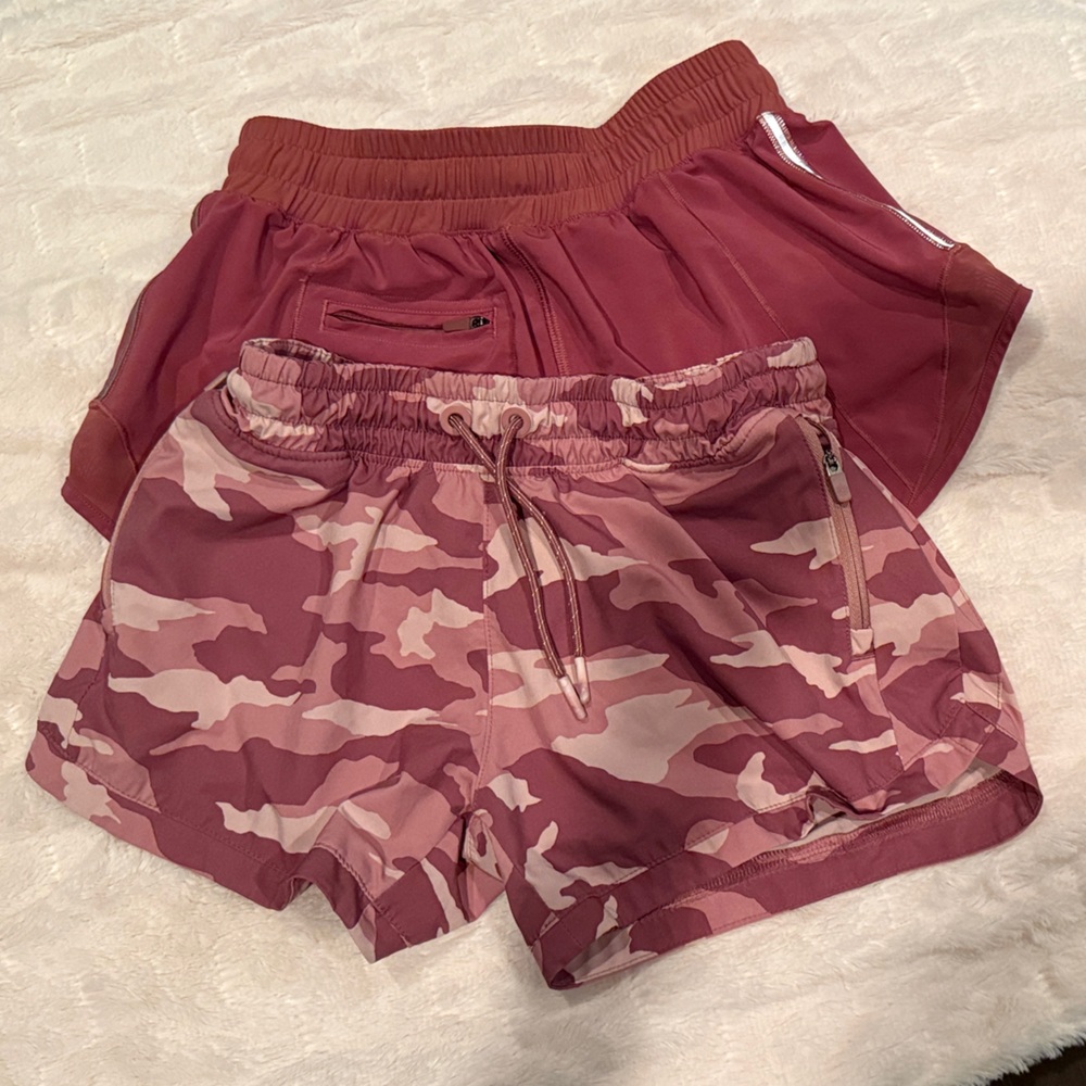 Athleta Girl Mauve Pink Camo Athletic Shorts and solid rose colored lined pair.